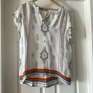 Large flowy blouse, lightweight and cool.